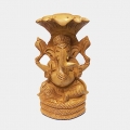 Wooden Ganesh sitting on Snake